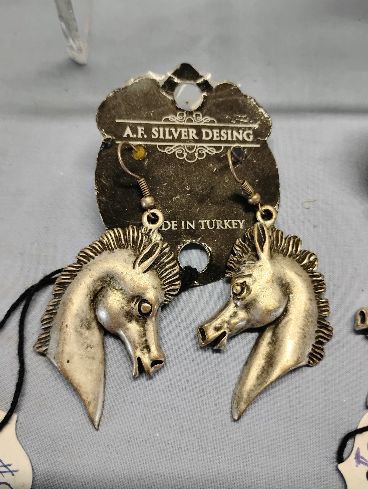 Horse head earrings